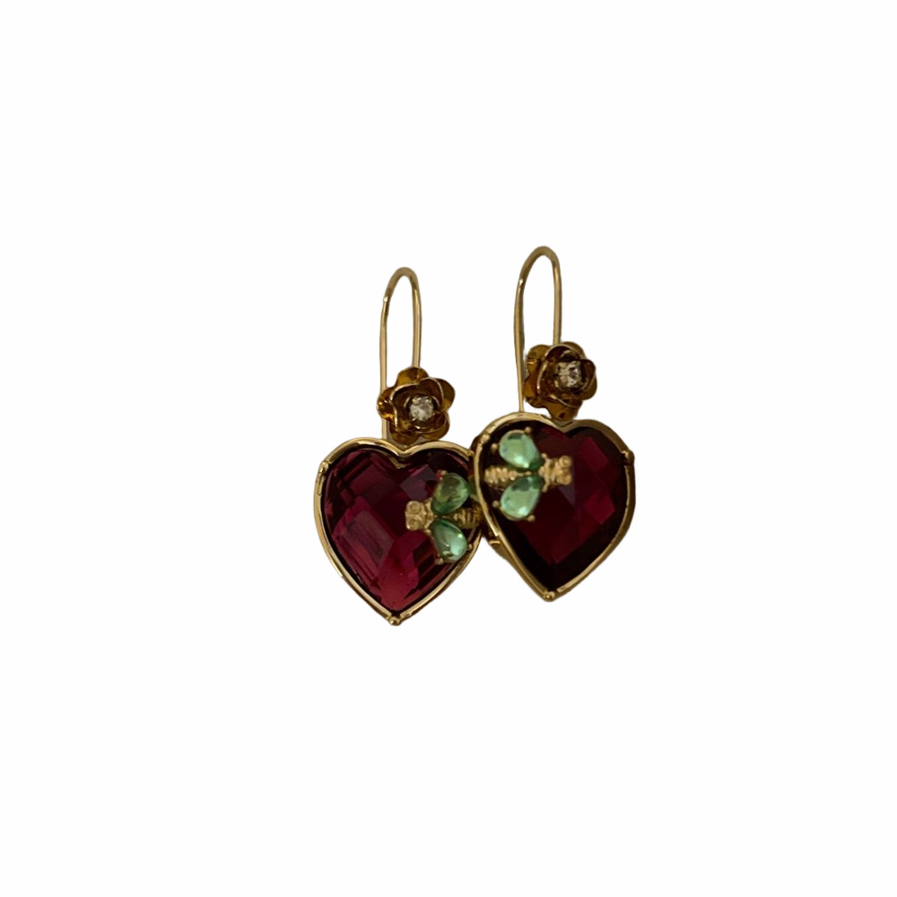 Betsy Johnson heart and critter dangle earrings.